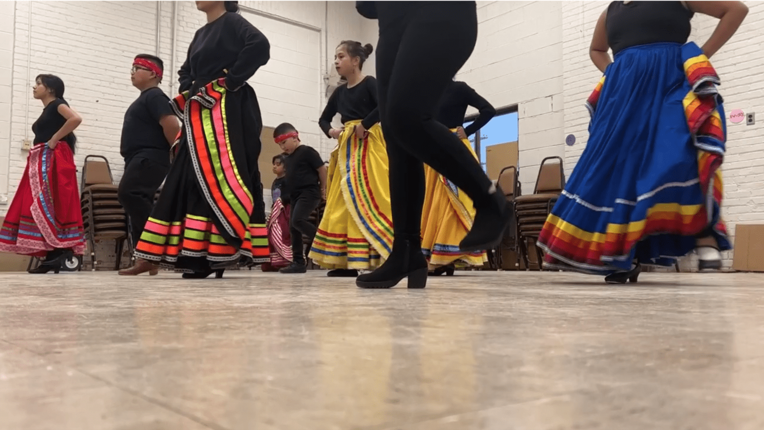 Members of Raíces de mi Pueblo Mexican Folkloric Dance Troupe dancing